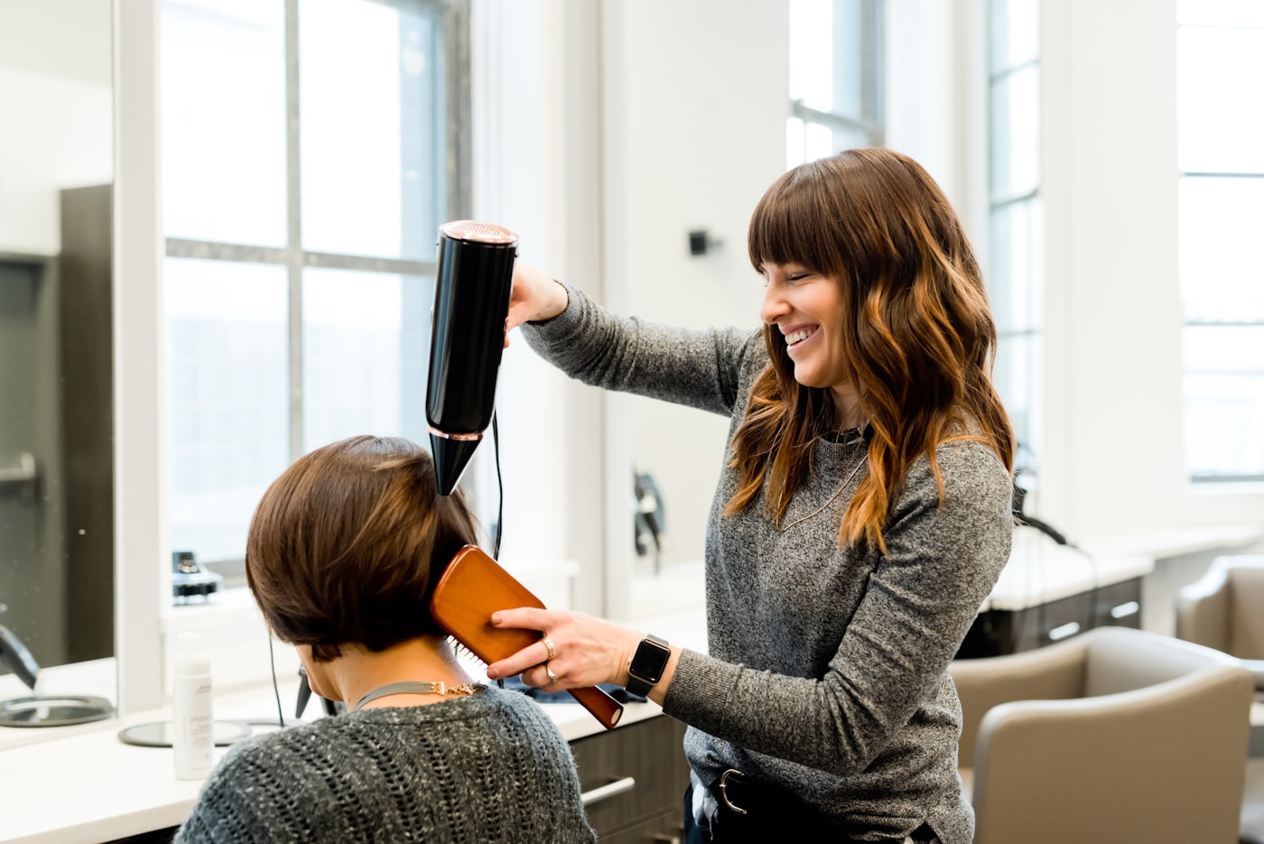 Stylist consulting with a guest